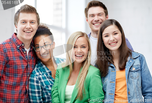 Image of group of happy high school students or classmates