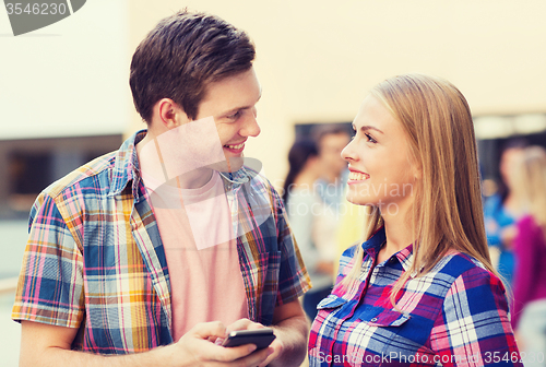 Image of group of smiling students outdoors