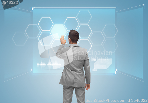 Image of businessman virtual screen with network