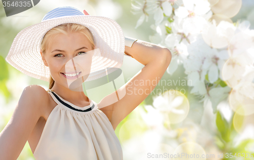 Image of beautiful woman enjoying summer outdoors