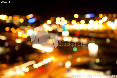 Image of golden bright lights on dark night background