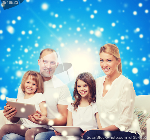 Image of happy family with tablet pc computers
