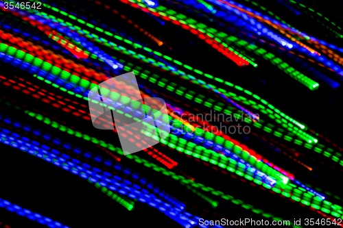 Image of colorful bright night lights over black background