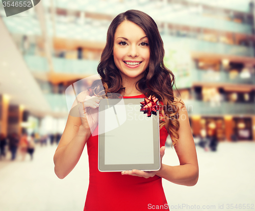 Image of smiling woman with tablet pc