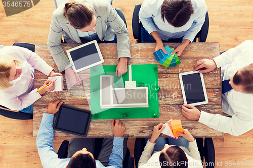 Image of close up of business team with project layout