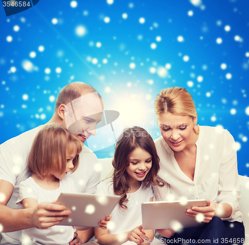 Image of happy family with tablet pc computers