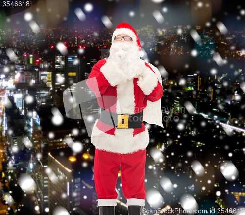 Image of man in costume of santa claus with bag