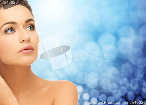 Image of beautiful young woman face and bare shoulder