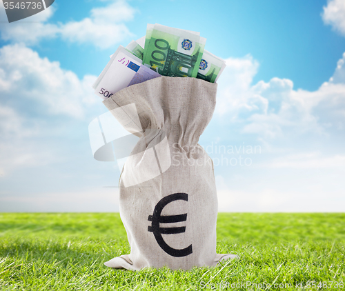 Image of close up of euro paper money in bag outdoors