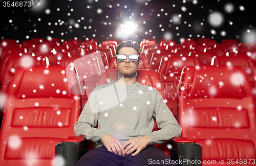 Image of young man watching movie in 3d theater