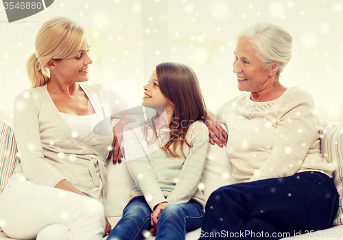 Image of smiling family at home