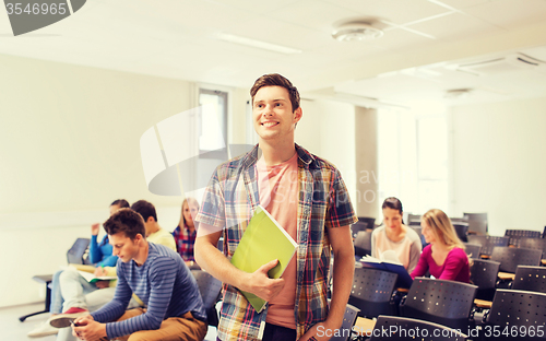 Image of group of smiling students in lecture hall