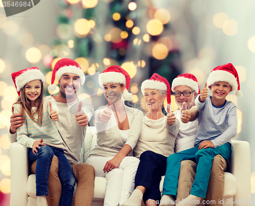 Image of happy family sitting on couch