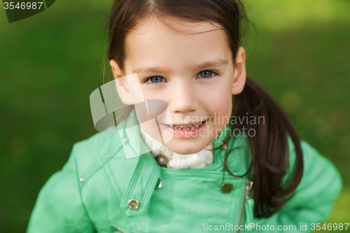 Image of happy beautiful little girl portrait outdoors