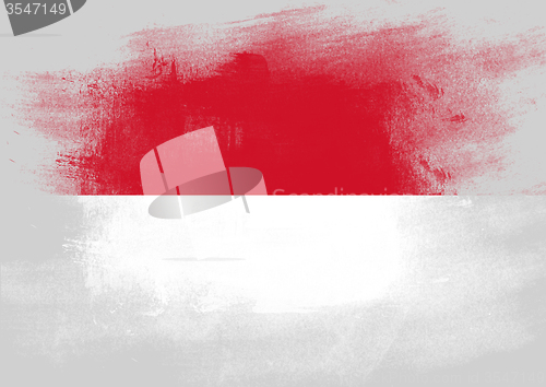 Image of Flag of Monaco painted with brush