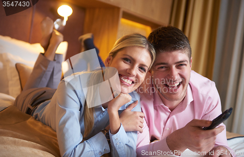 Image of young couple in modern hotel room