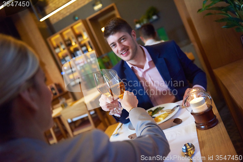 Image of business couple having dinner