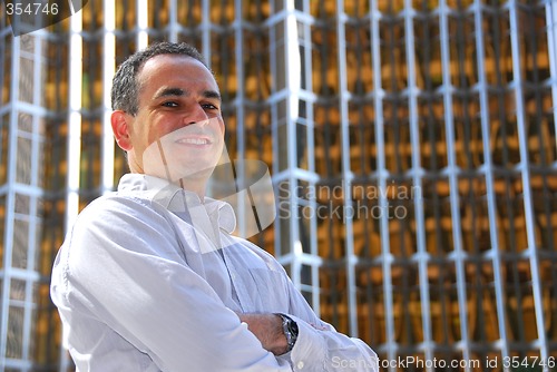 Image of Businessman arms crossed