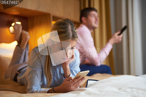 Image of young couple in modern hotel room