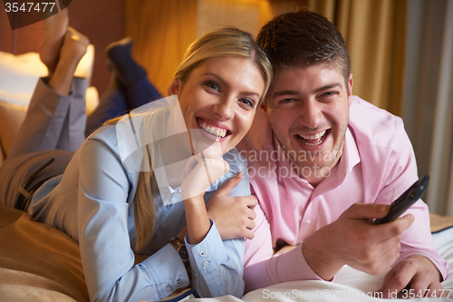 Image of young couple in modern hotel room