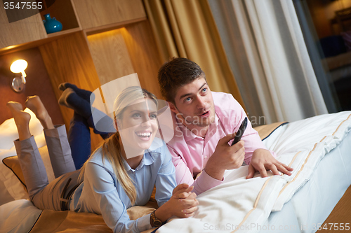 Image of young couple in modern hotel room