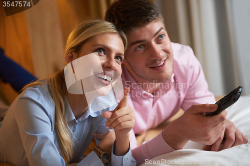 Image of young couple in modern hotel room