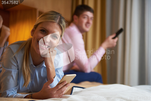 Image of young couple in modern hotel room