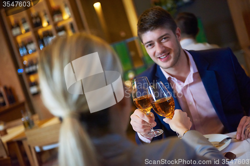 Image of business couple having dinner