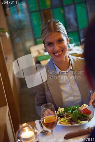 Image of business couple having dinner