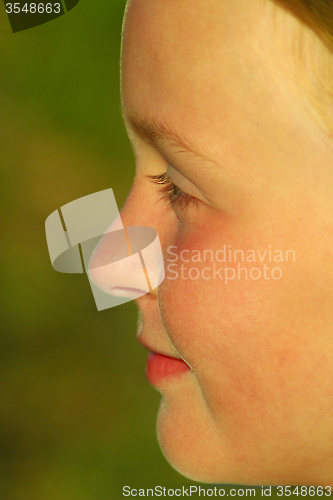 Image of teen's face in profile