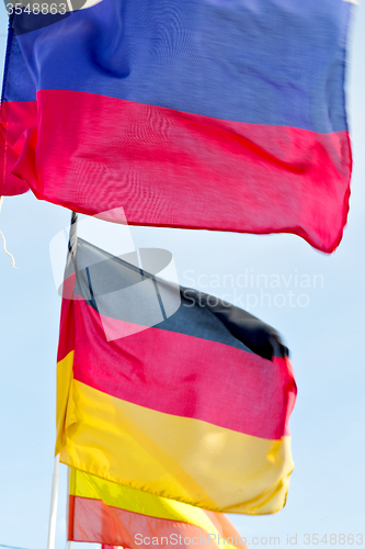 Image of world waving flag in    colour and spain