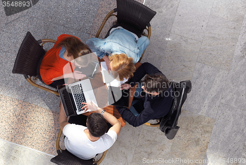 Image of students group working on school  project  together