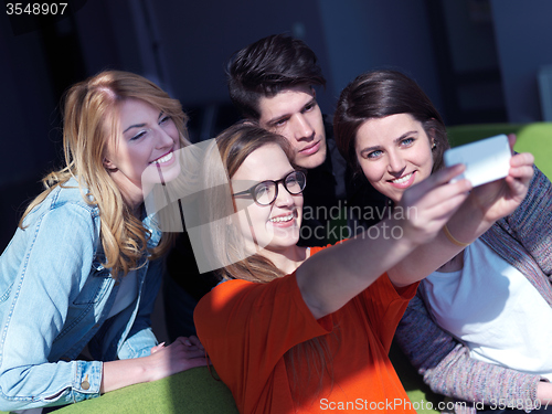 Image of students group taking selfie