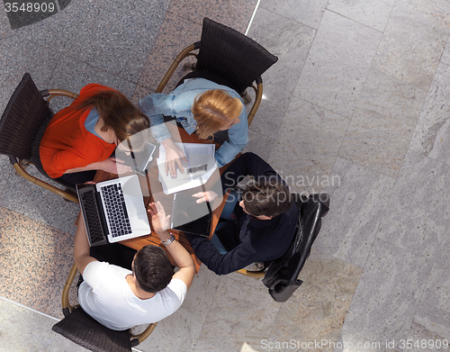 Image of students group working on school  project  together