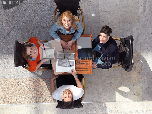 Image of students group working on school  project  together