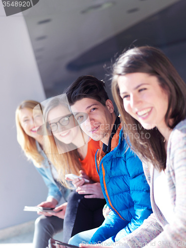 Image of students group working on school  project  together