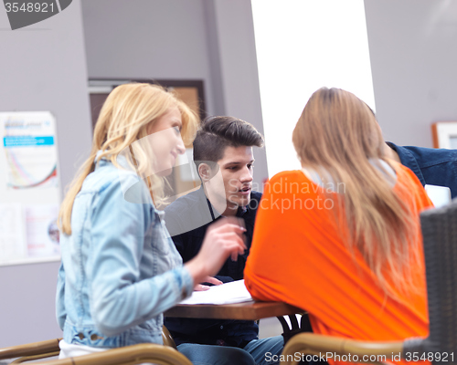 Image of students group working on school  project  together