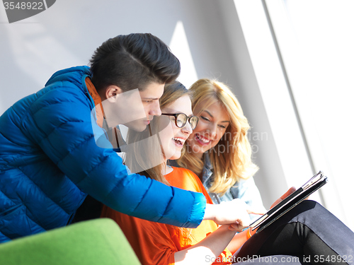 Image of students group working on school  project  together