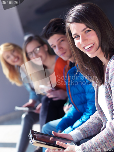 Image of students group working on school  project  together