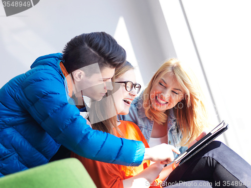 Image of students group working on school  project  together