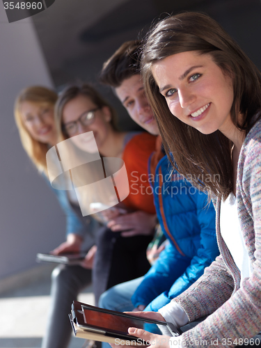 Image of students group working on school  project  together