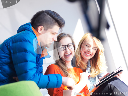 Image of students group working on school  project  together