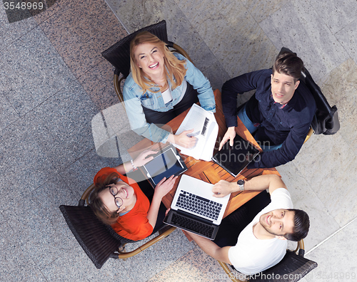 Image of students group working on school  project  together