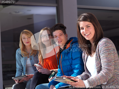 Image of students group working on school  project  together