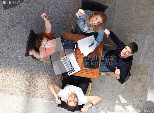 Image of students group working on school  project  together