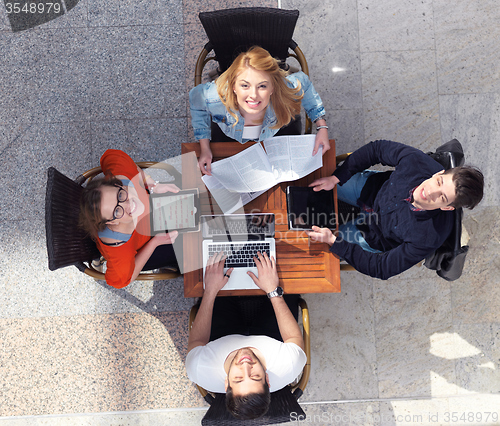 Image of students group working on school  project  together