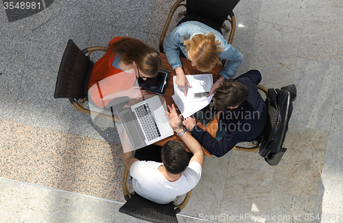 Image of students group working on school  project  together