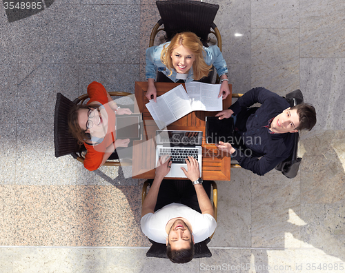 Image of students group working on school  project  together