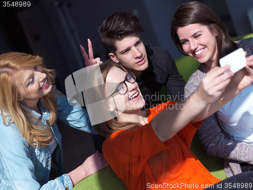 Image of students group taking selfie