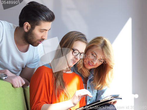 Image of students group working on school  project  together